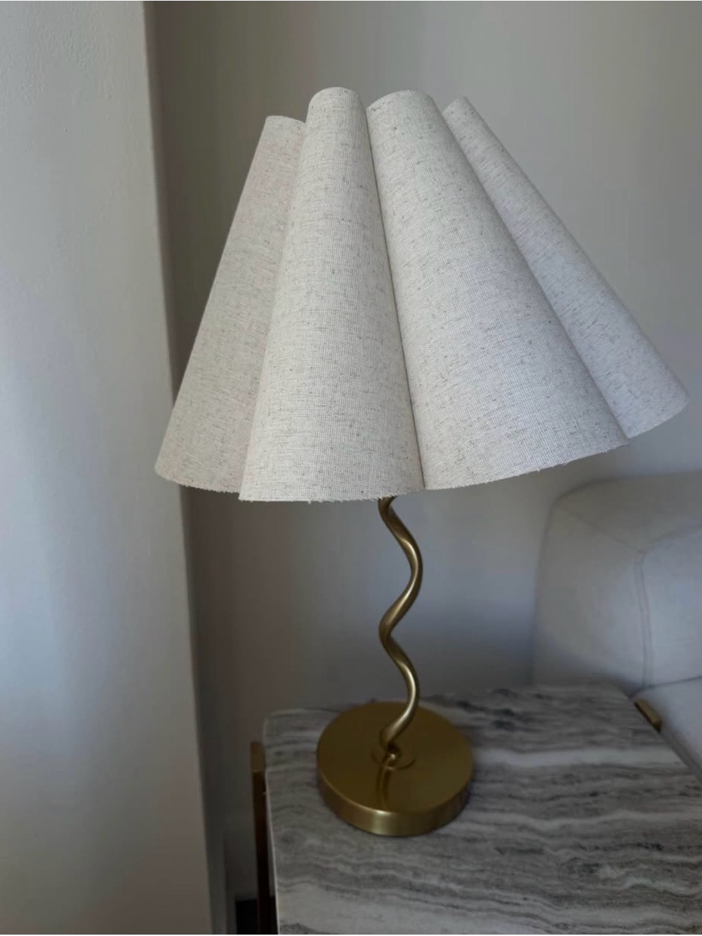 Curved Brass Table Lamp with Pleated Off-White Shade